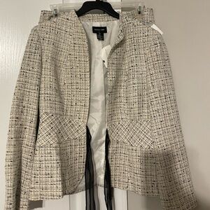 Brand New. Never worn. Two piece skirt set with tags.